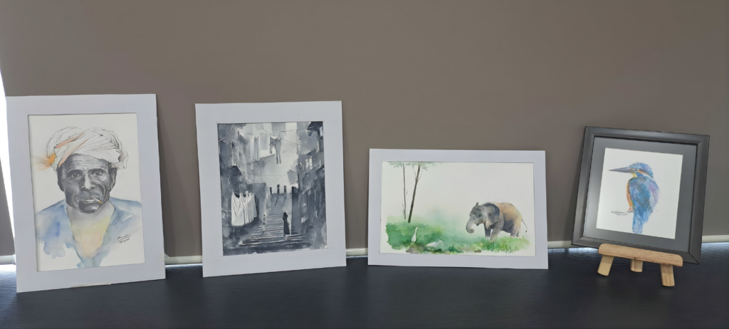 Simran standing on a pageant stage in a pink evening gown, holding a trophy and a bouquet of flowers